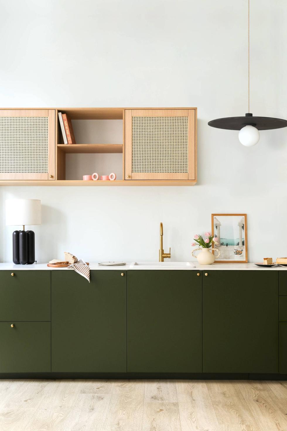 Kitchen in Olive with cane fronts.